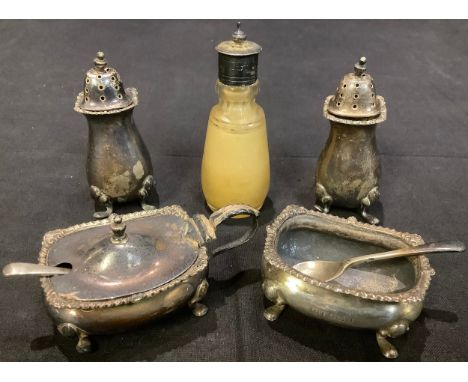 A silver four piece condiment set, Birmingham 1926; condiment spoons, Sheffield hallmarks; a silver mounted pepperette; 147g 