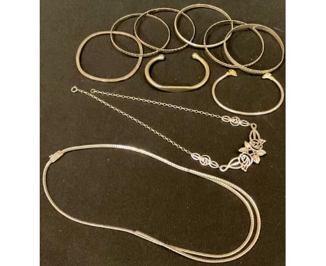 A silver openwork necklace, London hallmark indistinct; a silver necklace, silver bangles, 103.5g; a possibly low grade silve