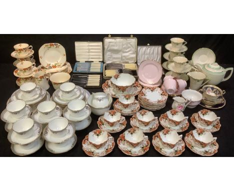 An Aynsley part tea service comprising cake plates, side plates, sugar bowl, cream jug, cups and saucers; a late Victorian pa