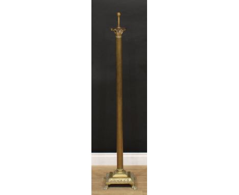 A brass floor standing lamp, Corinthian column, stepped square base, paw feet, 139cm high overall 