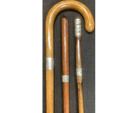 Walking Sticks - a Victorian silver mounted walking cane, Birmingham 1899; others similar (3) 