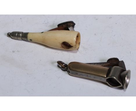 A 19th century bone novelty cigar cutter, as a champagne bottle, 5cm long, registration lozenge, c.1870; an 18ct rolled gold 