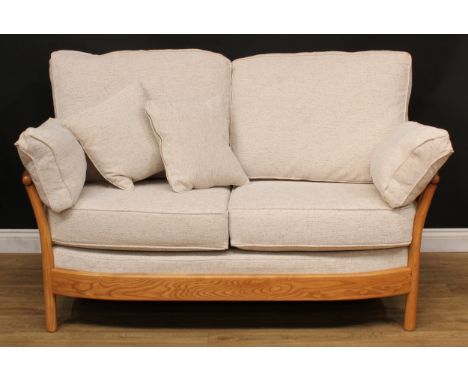 An Ercol elm Renaissance sofa, design 24112, fabric E631, 104cm high, the seat 141cm wide and 57cm deep, c.05/01/16 