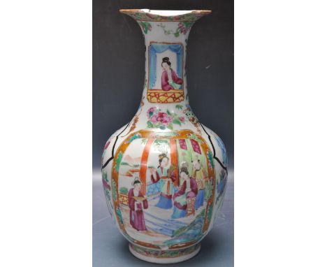 A late 19th century chinese oriental ceramic porcelain Cantonese vase of bulbous form with waisted neck, flared rim raised on