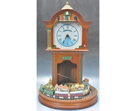 A Bradford's Editions 'Celebrations of Steam Flying Scotsman Clock', the circular base with continuous diorama and model trai