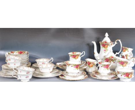 A Royal Albert ' Old Country Roses ' pattern tea service comprising teapot, coffee pot, sandwich plates, cups, saucers plates