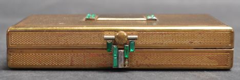 A vintage 20th century yellow metal Art Deco vanity / cigarette case having a engine turned exterior with a geometric pattern