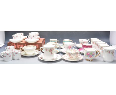 A collection of vintage tea cups and saucers to include Royal Albert Lavender Rose, a Lubern floral and gilt trio, a group of