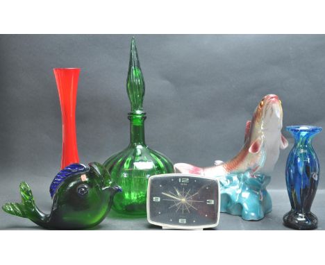 A collection of retro vintage studio art pottery and glass comprising of a Italian Genie bottle, Murano fish, Mdina, Jema Hol