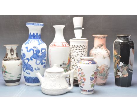 A collection of 20th century Chinese oriental and Japanese ceramic porcelain vases of various sizes and designs decorated wit