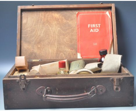 A WWII 1940s 20th century military First Aid Box comprising of a large mines dressing, bleach ointment, Tannic acid jelly, Ti
