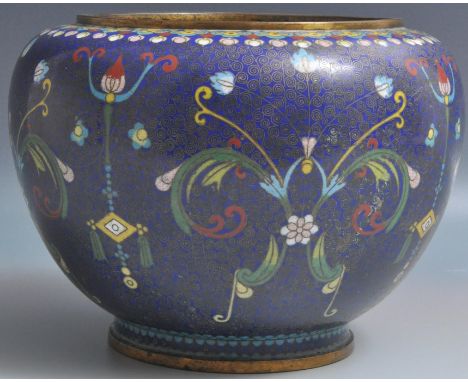 An early 20th Century Chinese cloisonne brass and enamel planter / plant pot. The enamel champleve decoration with geometric 