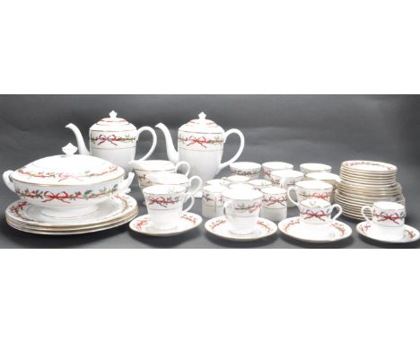 A vintage 20th century Royal Worcester tea / coffee / dinner service in the Holly Ribbons pattern comprising of two coffee po