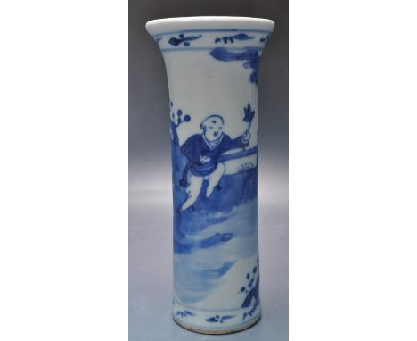 A 19th century Chinese oriental ceramic porcelain blue and white vase of cylindrical form with flared rim raised on a circula