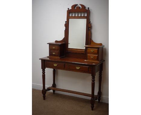 Victorian style hardwood dressing table, raised shaped bevel edge mirror back, two trinket and two long drawers, turned suppo