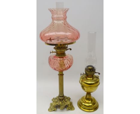 Cast brass reeded oil lamp with glass shade and reservoir H69cm and another brass oil lamp (2)