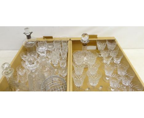 Cut glass drinking glasses including Tudor, ships decanter with silver-plated collar, pinched waist decanter with hallmarked 
