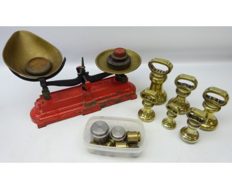 Parnall &amp; Sons painted cast iron shop scales with weights, L39cm set of six brass weights and other weights 