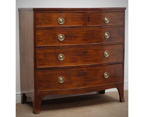 George IV mahogany bow front chest of two short and three long drawers, brass ring handles, shaped splayed feet, W106cm, H103