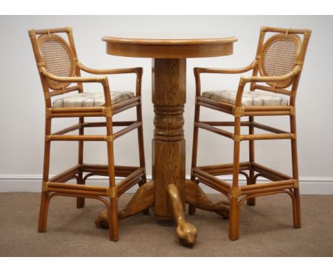 Light oak circular pedestal table, the four supports with ball and claw feet (D76cm, H111cm) and two bar chairs (3)