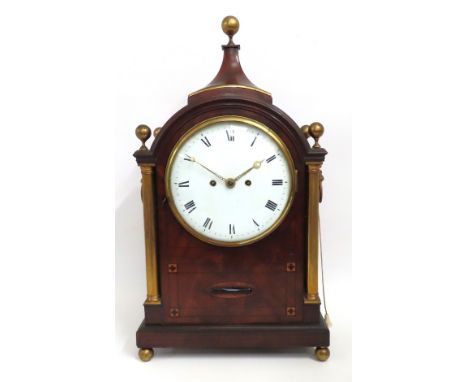 A Regency period mahogany cased twin fusee bracket clock with white enamelled dial, gilded hands & finials, inset to front wi