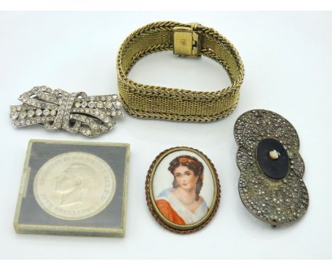 A gilt mounted Limoges porcelain brooch, three pieces of costume jewellery & a cased 1951 crown