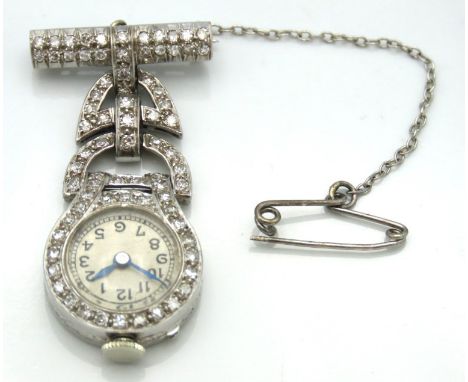 A 1930/40's art deco period diamond set platinum fob watch set with approx. 0.67ct of diamond, winds & runs, rear door stiff,