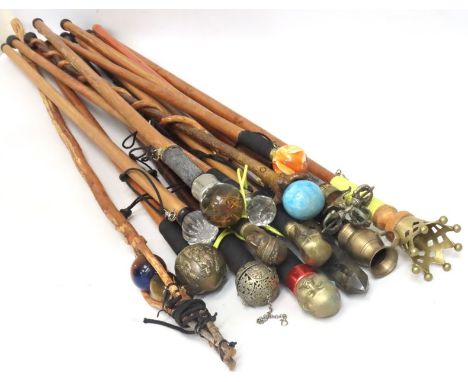 Fifteen walking canes & staffs with various finials including scorpion in resin, glass, horn, Buddha, crystal, stone, etc. ap