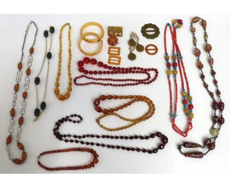 A selection of various beads & costume items including glass & an antique white metal necklace, Lucite type bangles & buckles