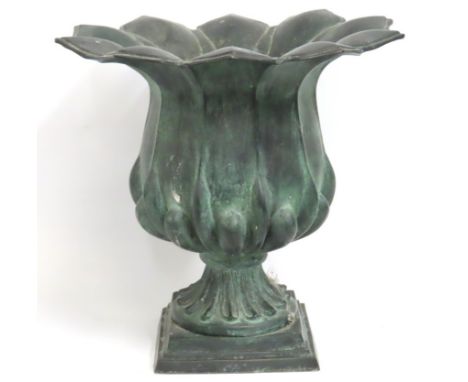 A cast "bronze" garden urn of organic form, 398mm diameter x 390mm high