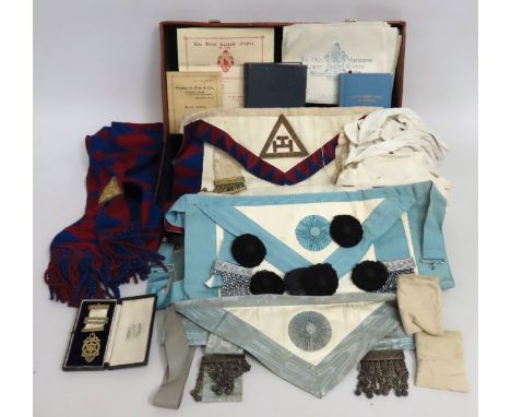 A selection of freemasonry items including a silver medallion with case