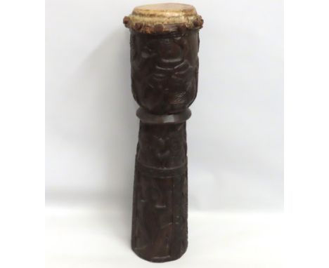 A carved African Bamileke tribal art drum from Cameroon, 1055mm tall