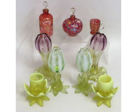 A 19thC. cranberry glass scent bottle with applied decor, one similar, two pairs of spill vases, a pair of vaseline style gla