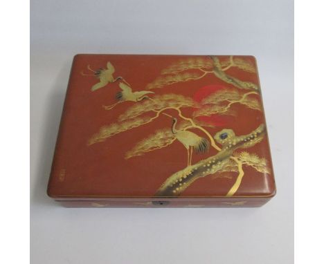 A Meiji/Taisho Period Japanese lacquer box and cover Decorated with a tan coloured lacquer with a gilded pine tree and glided