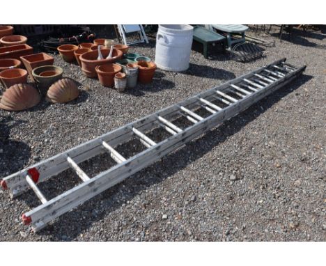 An aluminium double extending ladder