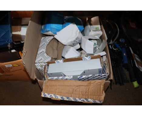 A box containing motion activated outdoor lighting, fuse box housings, ceiling lights etc.