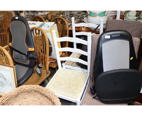 A pair of white painted ladder back chairs