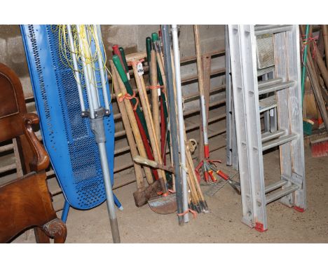 A quantity of long and short handled gardening tools to include branch loppers, quantity of Wolf tools, drain rods, axes, she