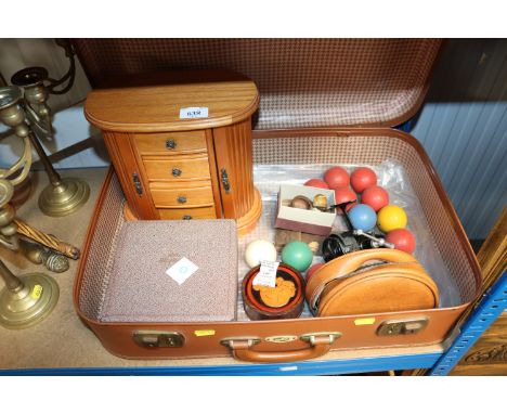 A suitcase and contents of a jewellery chest, snooker balls, fishing reel etc.