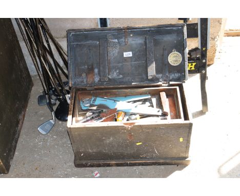 A wooden carpenters chest and quantity of tools