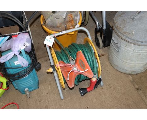 A hose reel and hose with a Dron-Wal sprinkler head