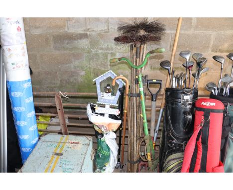 A quantity of chimney sweeping rods together with a small quantity of Christmas decorations and long handled garden tools to 