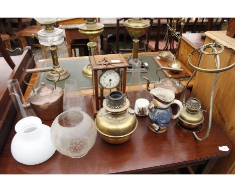 AN EARLY 20TH CENTURY MAHOGANY CASED ANNIVERSARY CLOCK two copper kettles, parts to balance scales, oil lamps, a Royal Doulto