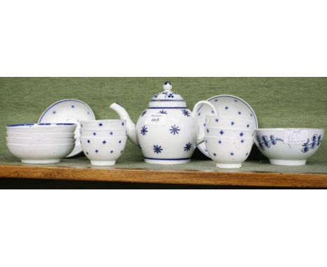 A 19TH CENTURY OVOID PEARLWARE TEAPOT decorated with stars in cobalt blue 14cm high together with six matching teabowls and s