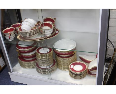 A WEDGWOOD 'ULANDER POWDER RUBY' PATTERN DINNER SERVICE consisting of twelve dinner plates, small bowls, large bowls, soup cu