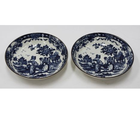 A PAIR OF 19TH CENTURY BLUE AND WHITE PORCELAIN SAUCERS, 13cm diameter