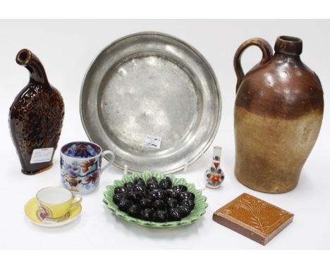 AN 18TH CENTURY PEWTER DISH with marks to the underside, an 18th century stoneware flagon, a Masons ironstone mug with King m
