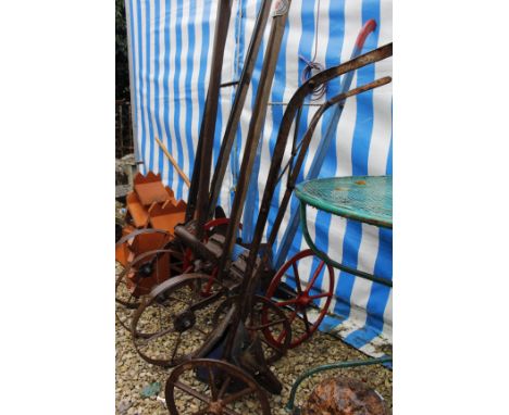 A GROUP OF FIVE HAND OPERATED SEED DRILLS and small seed drills to go with a group of various tools to include a draw knife, 
