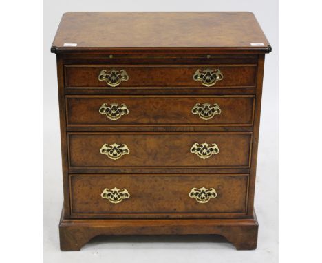 A SMALL SIZED GEORGIAN STYLE BURR WOOD VENEERED DRESSING CHEST with brushing slide over four graduated long drawers and stand