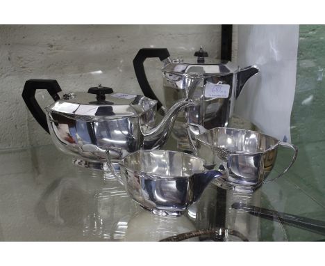 AN ART DECO SILVER PLATED FOUR PIECE TEASET with teapot, a hot water jug, milk jug and sugar basin (4)